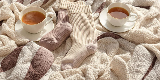 Warm diabetic socks for men on cozy blanket